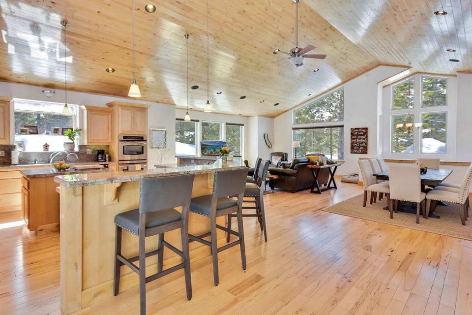 spacious great room, kitchen  and dining area