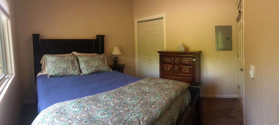 First bedroom with queen bed.