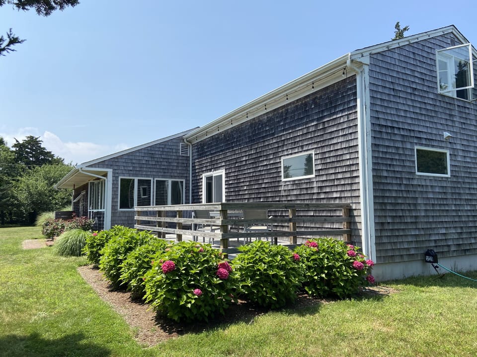 Front deck and house