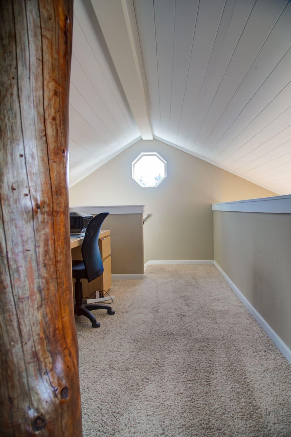 South view from upstairs media room, including  a beautiful tree trunk support.