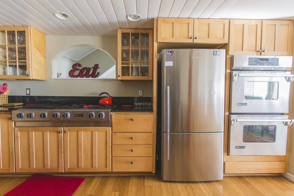 Top-tier appliances greet you in the spacious, highly functional kitchen.