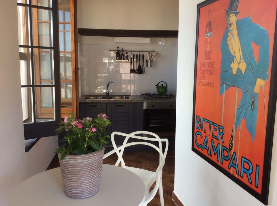 View of breakfast nook into kitchen.