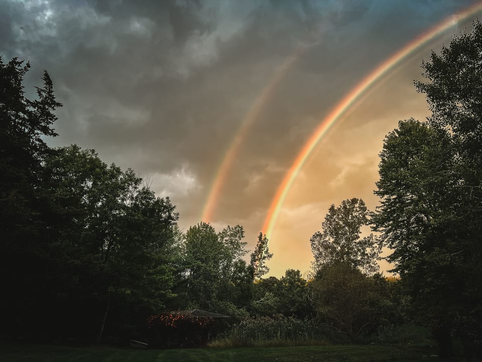 Double rainbow over the pond