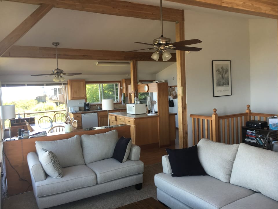 Living room looking into the dining room and kitchen