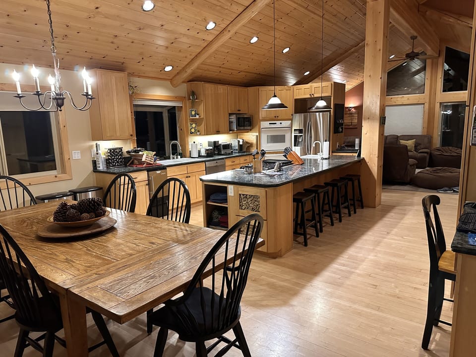 Kitchen, Dining Room Table, Breakfast bar for 4, more chairs are in closet. 
