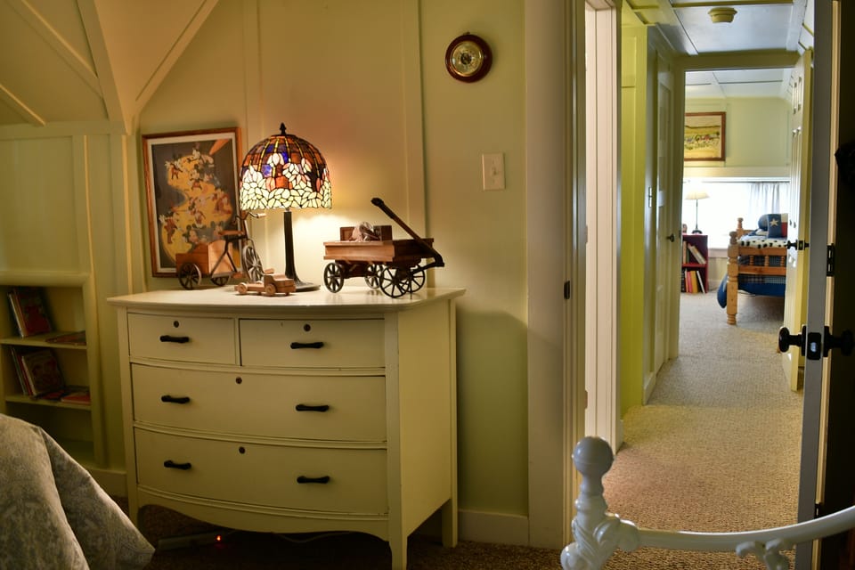 Upstairs Master Bedroom With Bathroom On Left Side in Hallway.