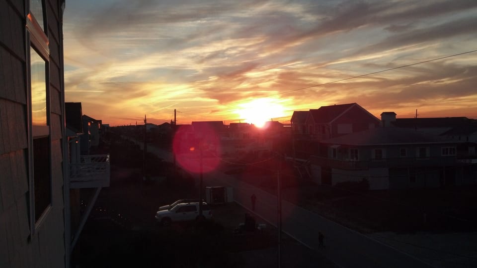 Winter sunset from street side balcony.