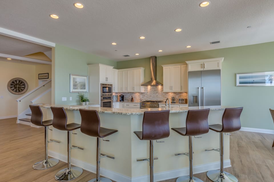 Socialize around the kitchen.