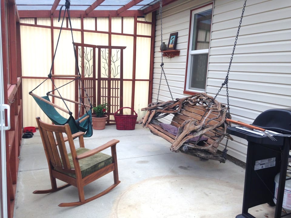 Hang out on  the enclosed back porch. 