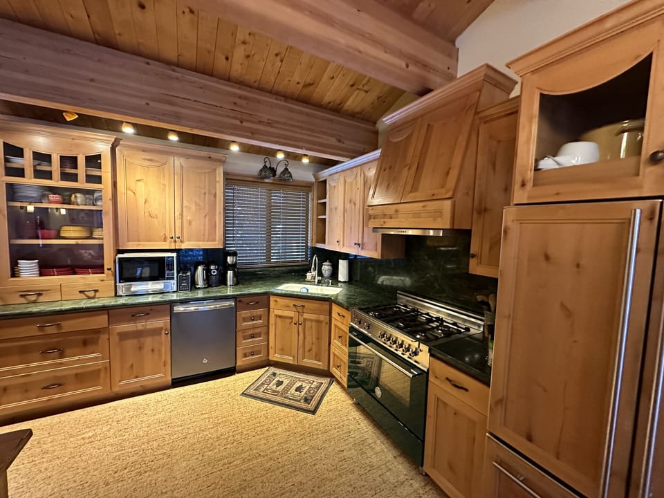 Spacious full kitchen located in great room upstairs