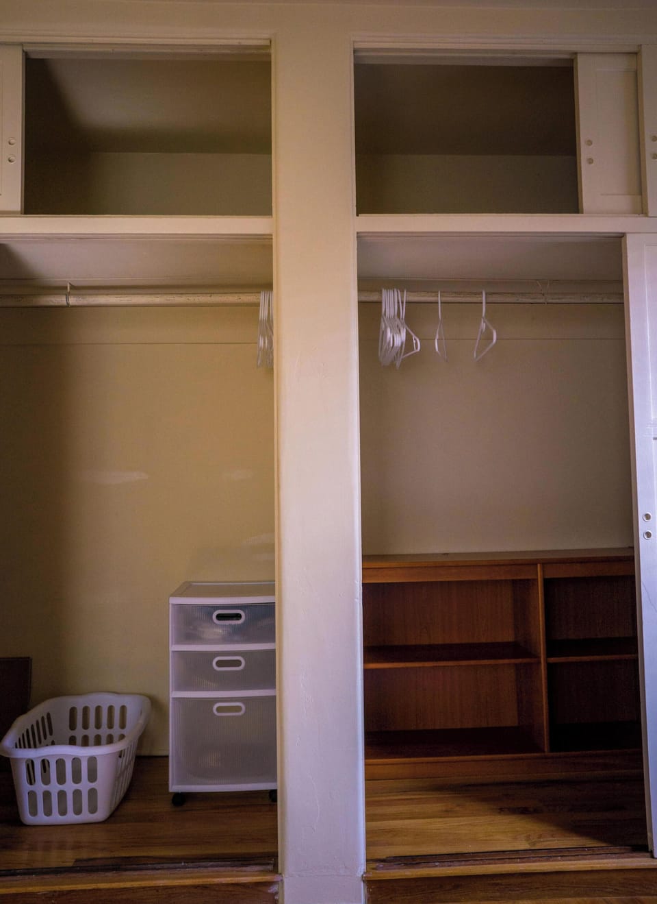 Two big bedroom closets with internal shelves and drawers for long-term visitors