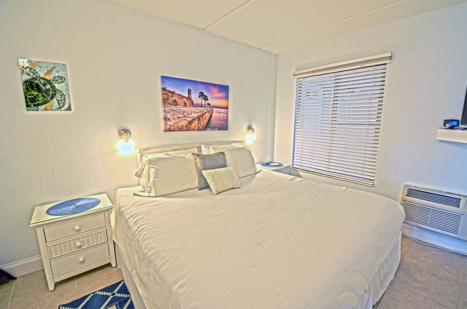 Relax at the end of a long beach day in this comfy king bed.