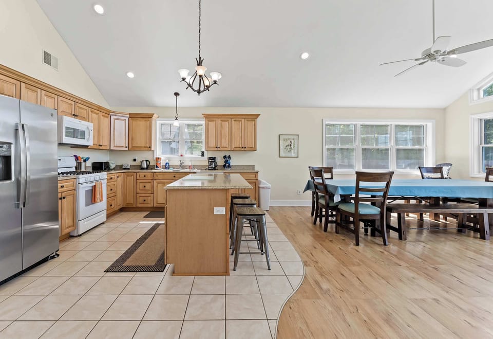 Side view of the Heron's Landing kitchen and extra-roomy dining table