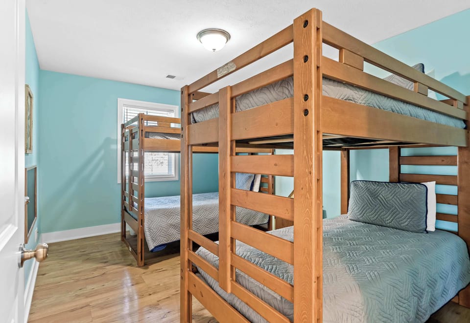Kid's double-bunk bedroom in Heron's Landing (4 total twin beds), with closet (bedroom 7 of 7)