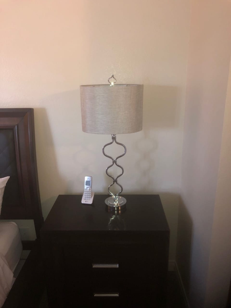 Nightstand w/phone and lamp in master