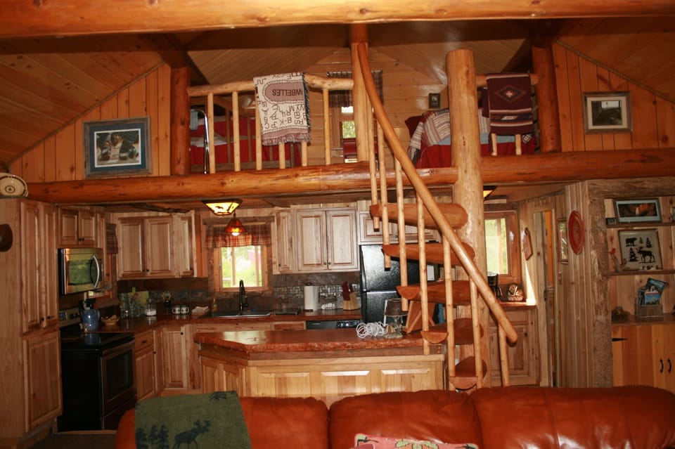 View from the living room into loft and kitchen.