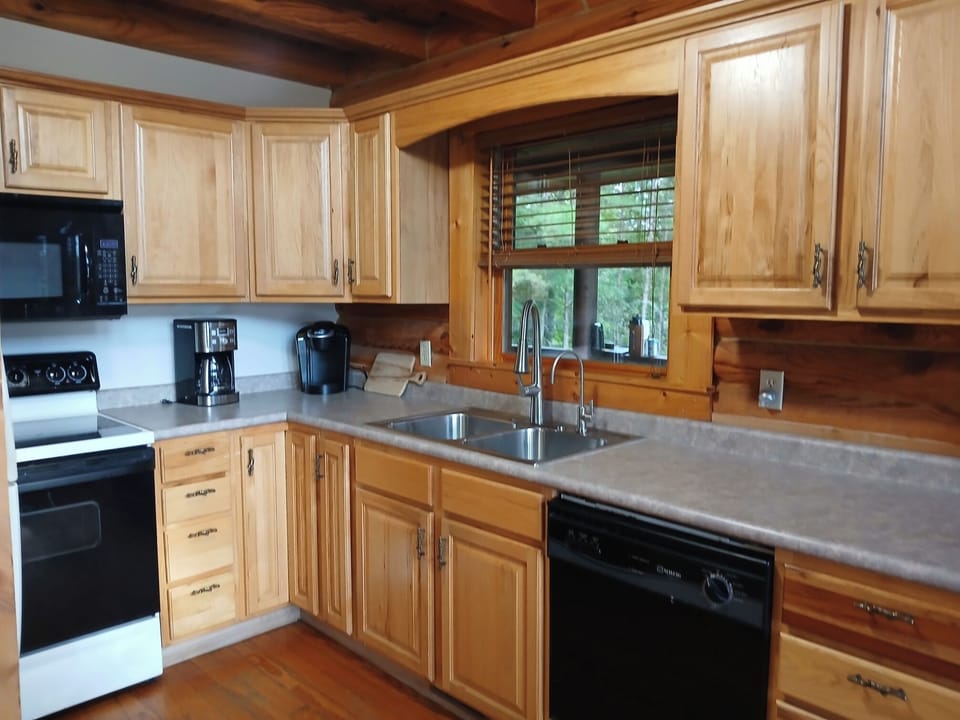 Main floor kitchen fully stocked with all you need to make great meals
