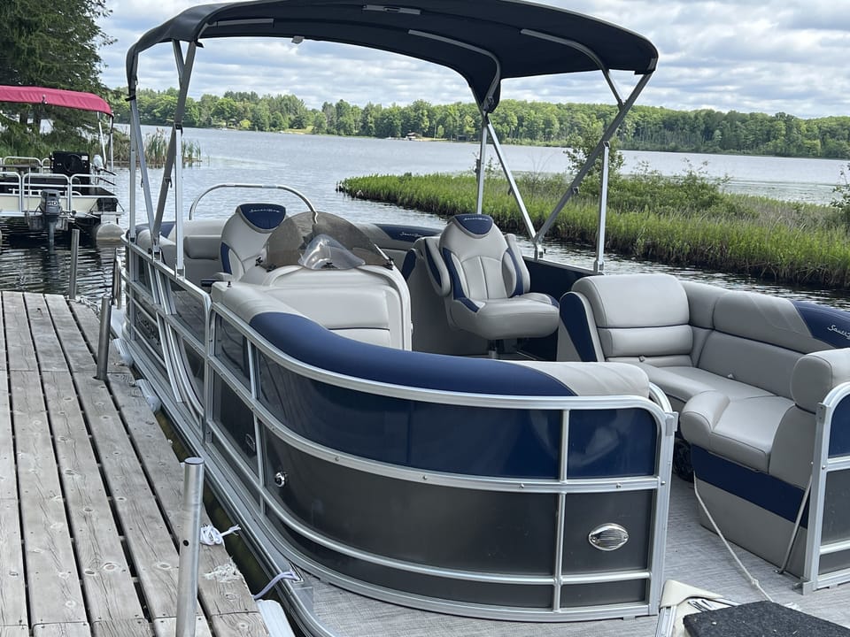 24-foot pontoon included in rental, photo shows pontoon and view from our dock.