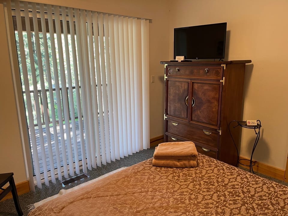 Bedroom 2 with a smart streaming TV