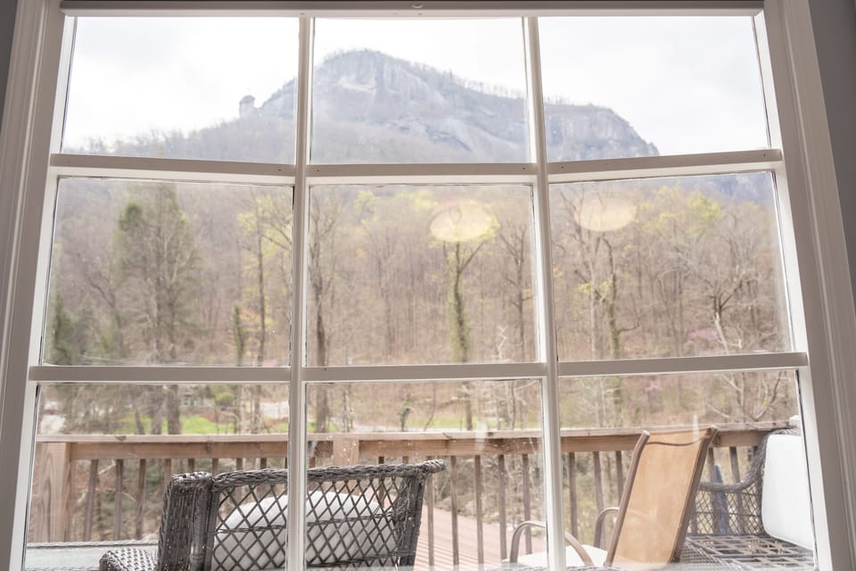 Large window in Bedroom 1 overlooking the beautiful Chimney Rock mountainscape!