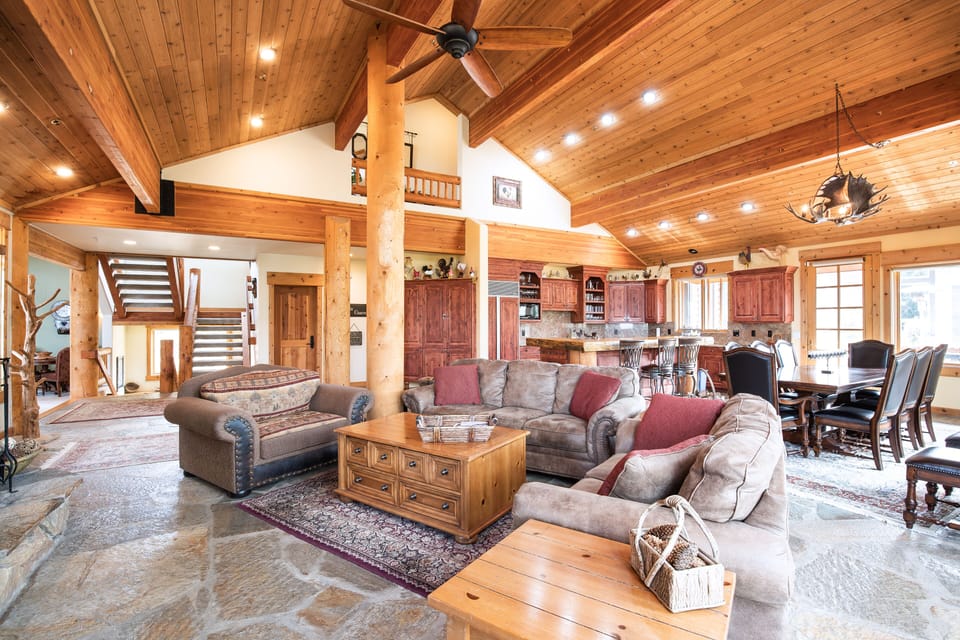 Vaulted ceiling in Great Room.  Living area, dining area and designer kitchen