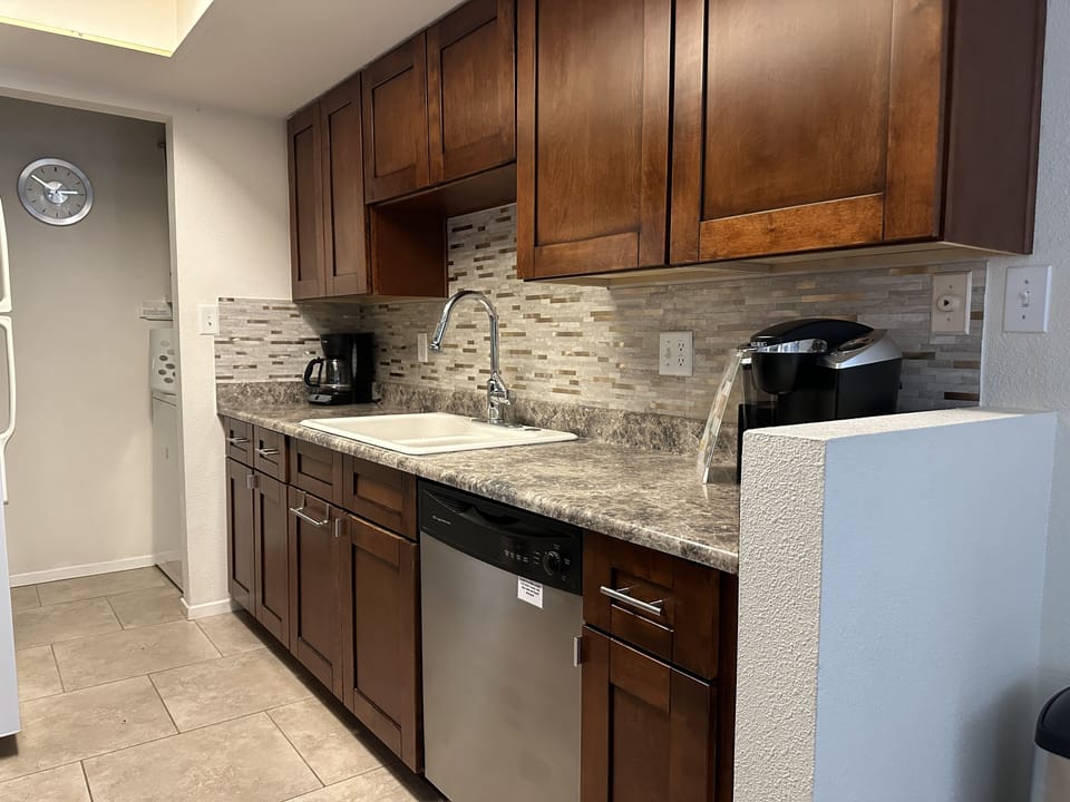 Full size kitchen is fully equipped with major appliances. Laundry in back