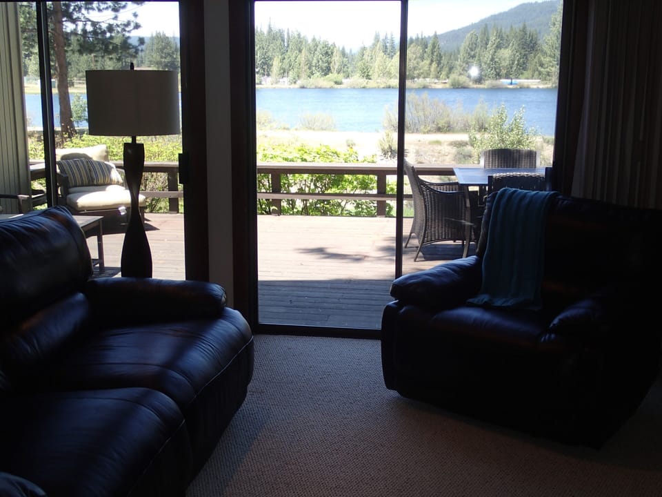 Living room with a view.  Both the sofa and chair recline