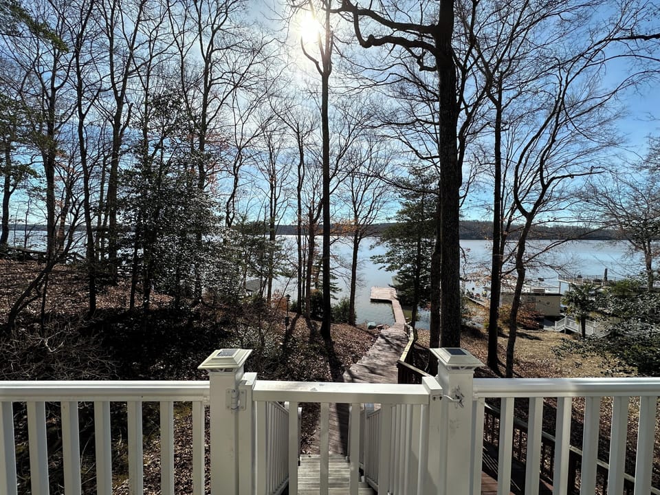 Awesome views of main lake and plenty of outdoor seating from main level deck