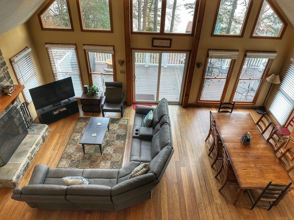 Main Level Living Room with Amazing Lake views and access to main level deck