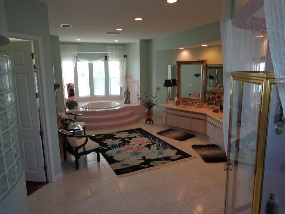 Master bath Jacuzzi with bay window looking at channel ocean view.