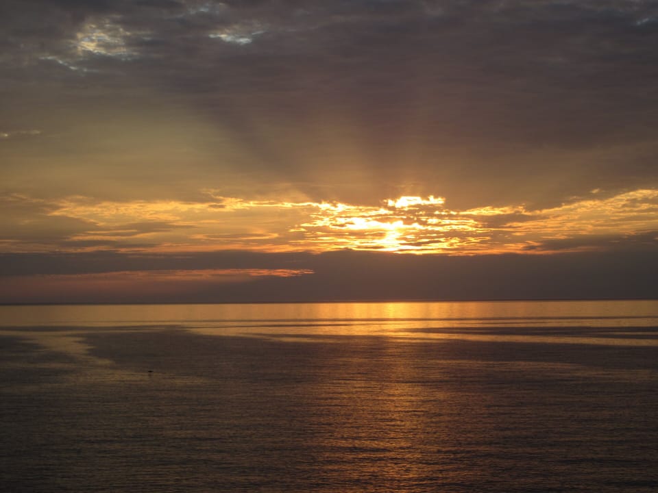 Just another normal sunrise looking from our pool/patio area