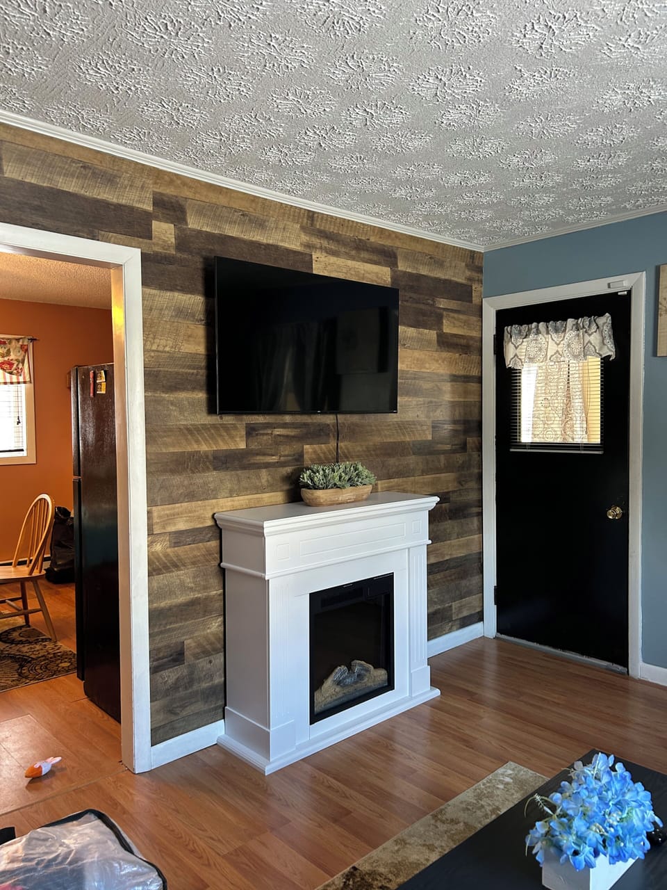 living room new fireplace and accent wall