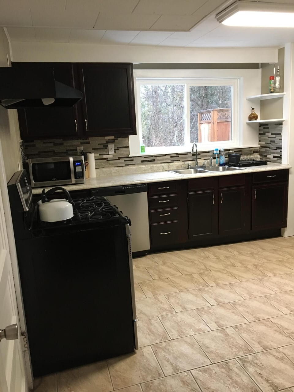 Kitchen with a view, looking out to the deck and river.
