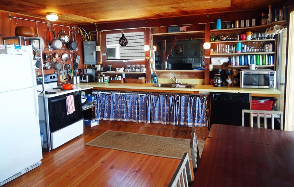 Fully stocked kitchen, including microwave and dishwasher.