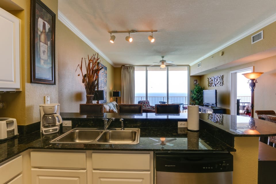 Seating for three at the bar with granite counter tops