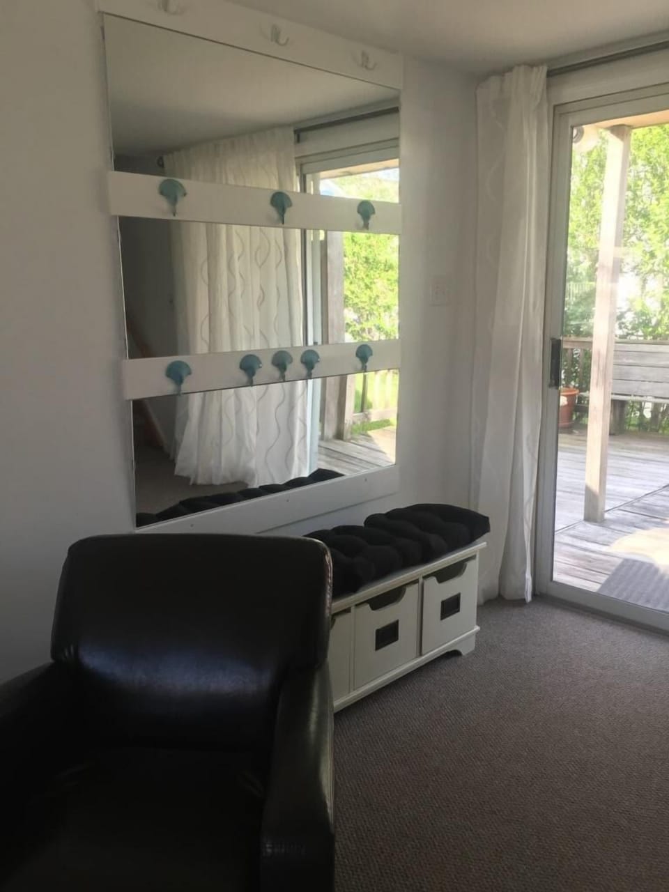 Family room looking toward deck.  Half bath and stair on the right out of view.