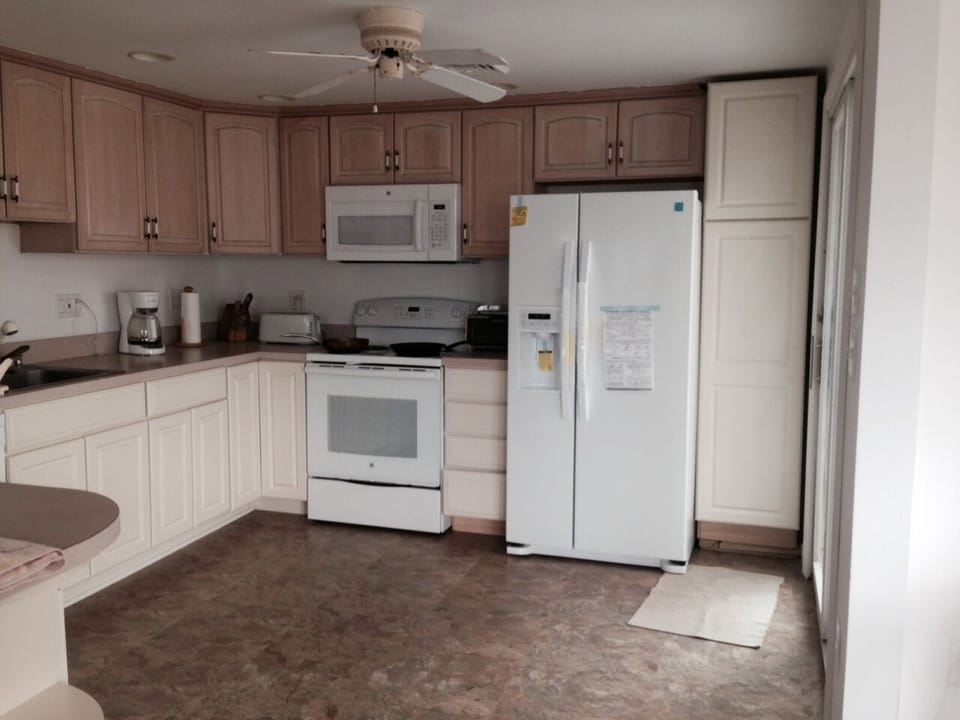 Vinyl floor in kitchen and dining.  