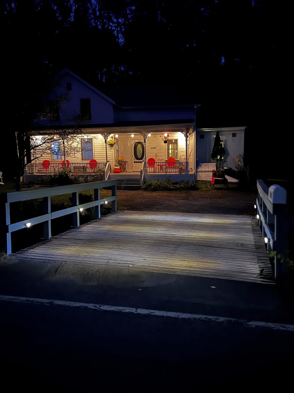 Lighted bridge entrance in evening