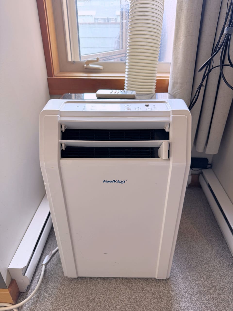 Portable Air Conditioning Unit installed during the warmer months (May-Sept)