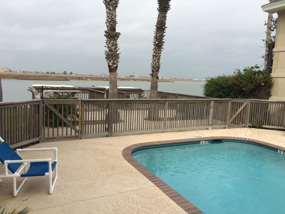 pool area overlooking Lake Padre Island