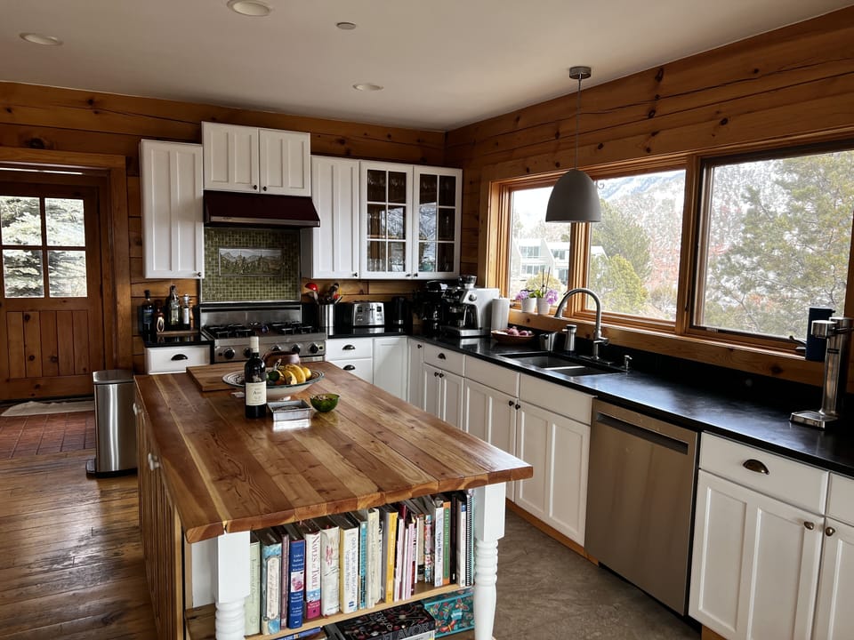 Open, well-appointed kitchen with a view