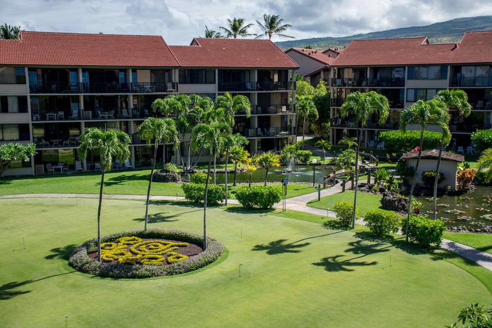 View of the putting green and the West Maui Mountains.