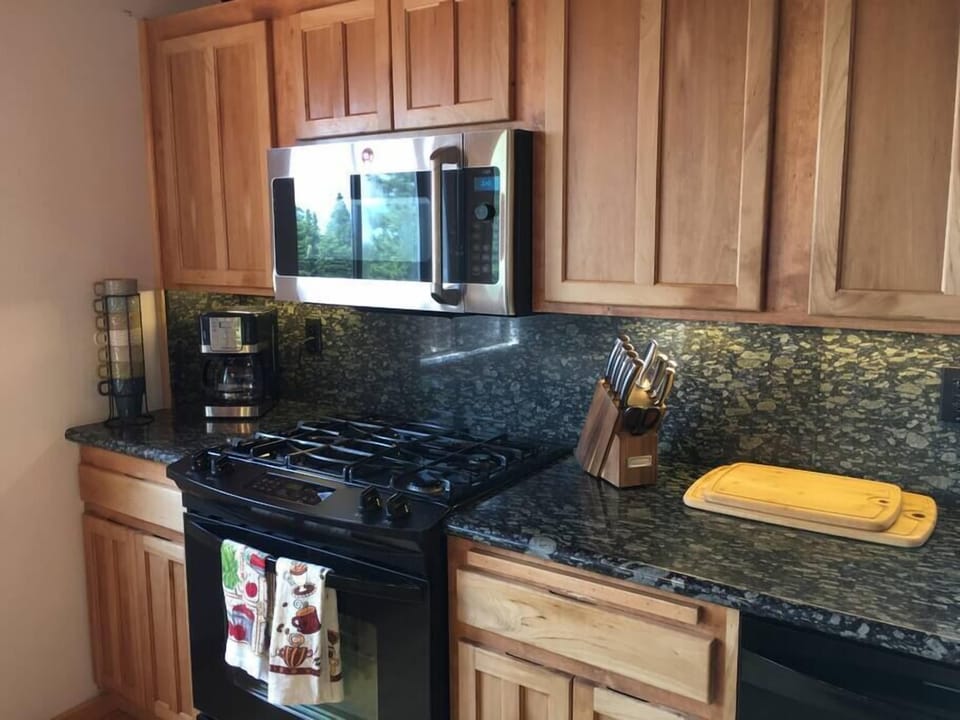 Fully equipped kitchen with updated appliances 