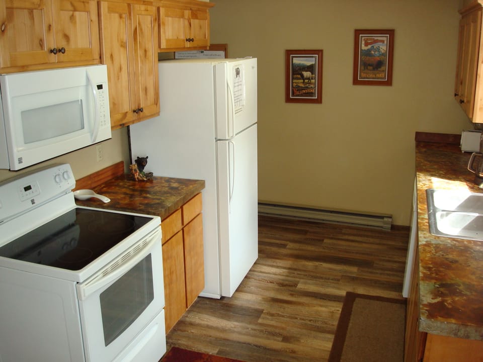 Enjoy making great meals together w/ lots of counter space & a ceramic cooktop.