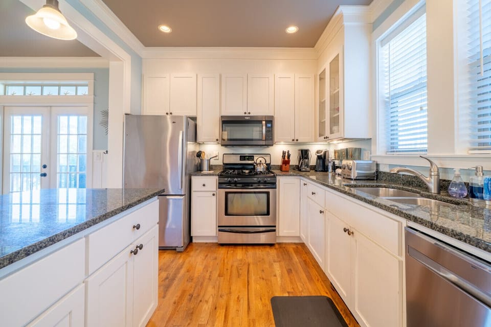 Fully equipped for any meal—featuring high-end appliances and plenty of counter space.