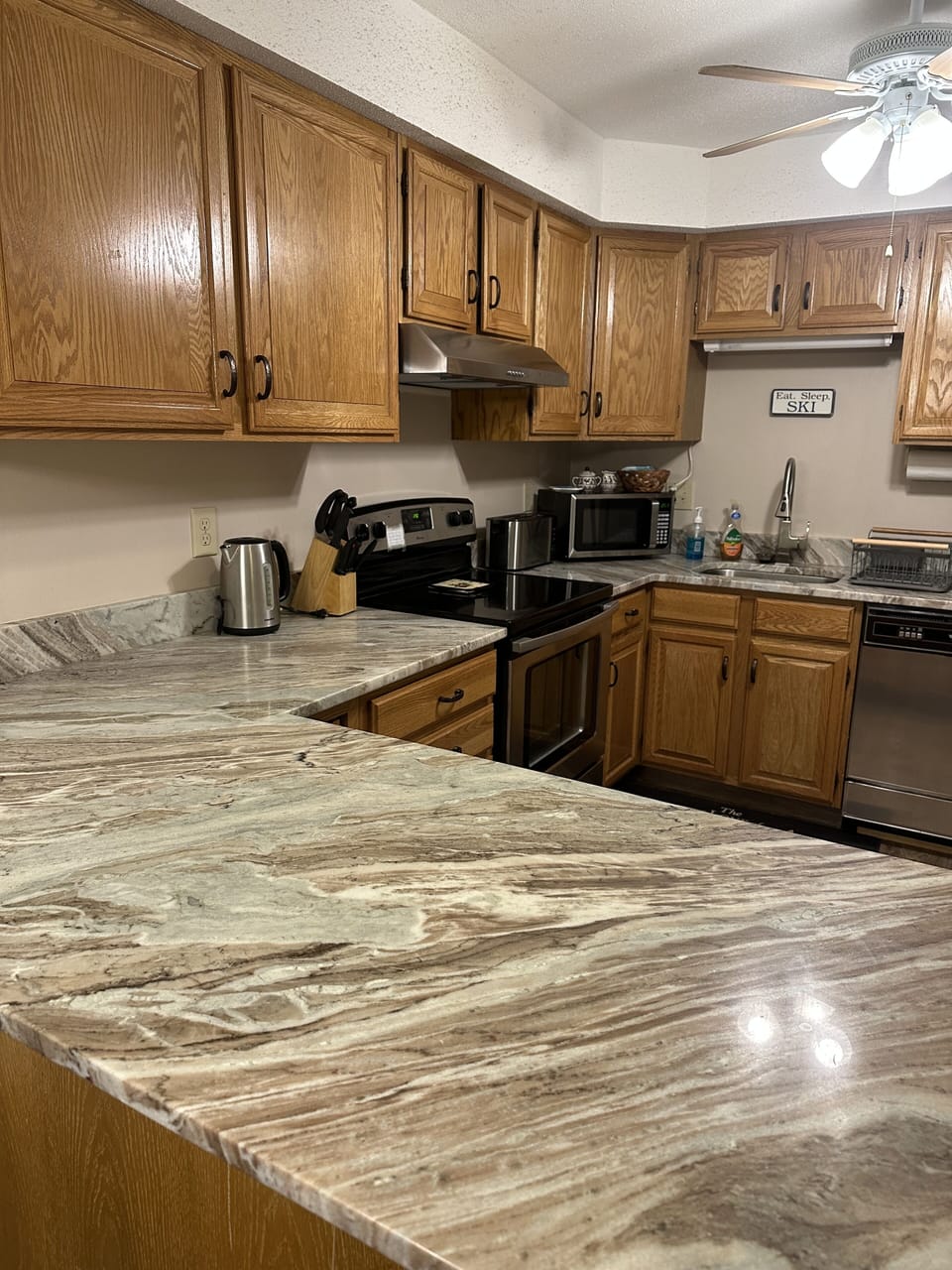 Dishwasher is a little noisy but dishes come out spotless and sparkling!