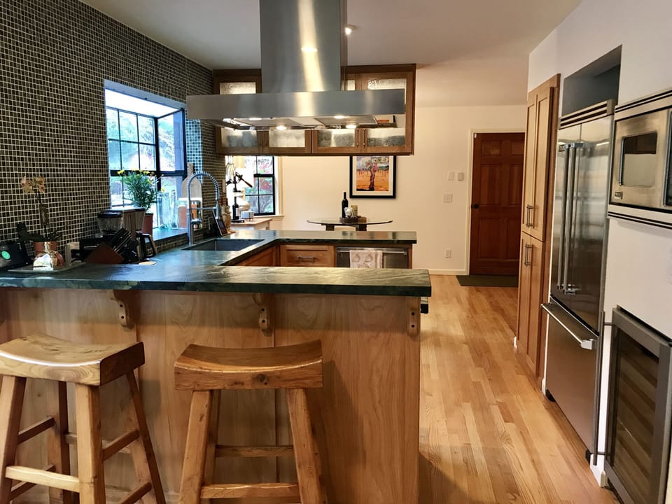 Kitchen w/bar seating and wine fridge