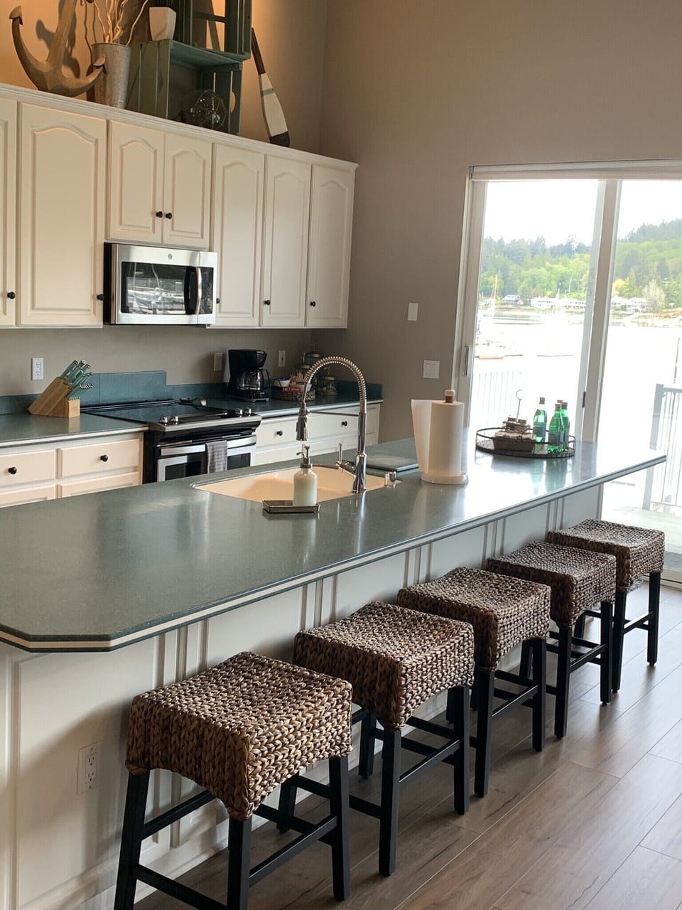 Kitchen with large island and bar stools