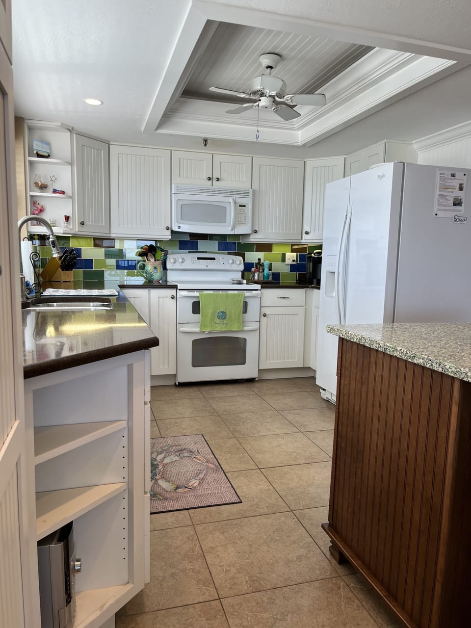 Modern, renovated kitchen with serving/dining island