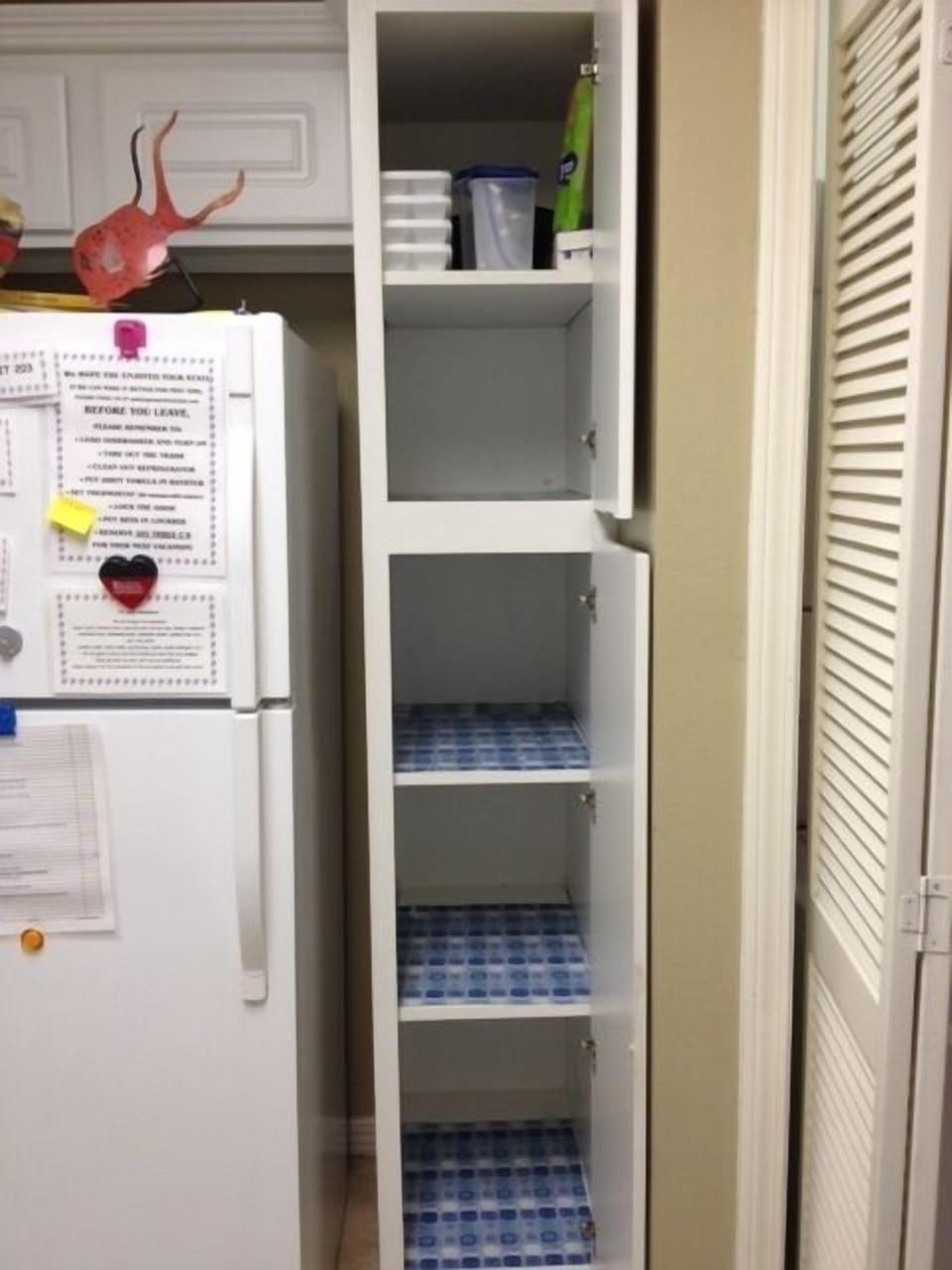 Roomy pantry for grocery items and supplies.